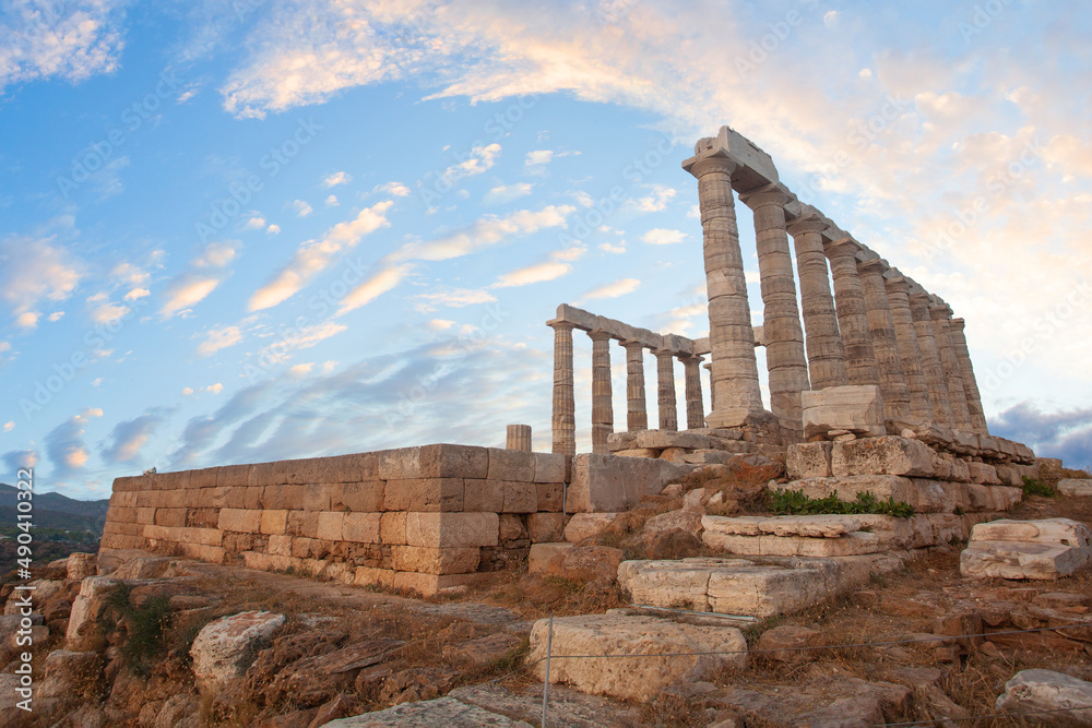 Temple of Poseidon at Sounion, Greece. Ruins and sky clouds