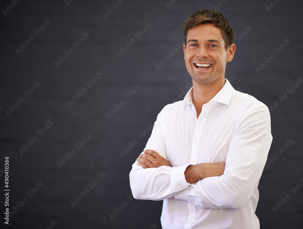 Happy to be on the job. Portrait of a happy young business man. Happy to be on the job. Portrait of a happy young business man.