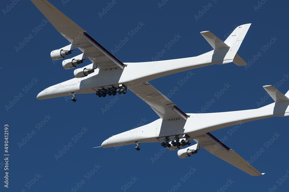 Mojave, California, USA - February 24, 2022: carrier aircraft Scaled  Composites Model 351 Stratolaunch with registration N351SL shown airborne  over the Mojave Air and Space Port. Stock Photo | Adobe Stock