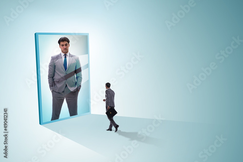 Young businessman in alter ego concept © Elnur