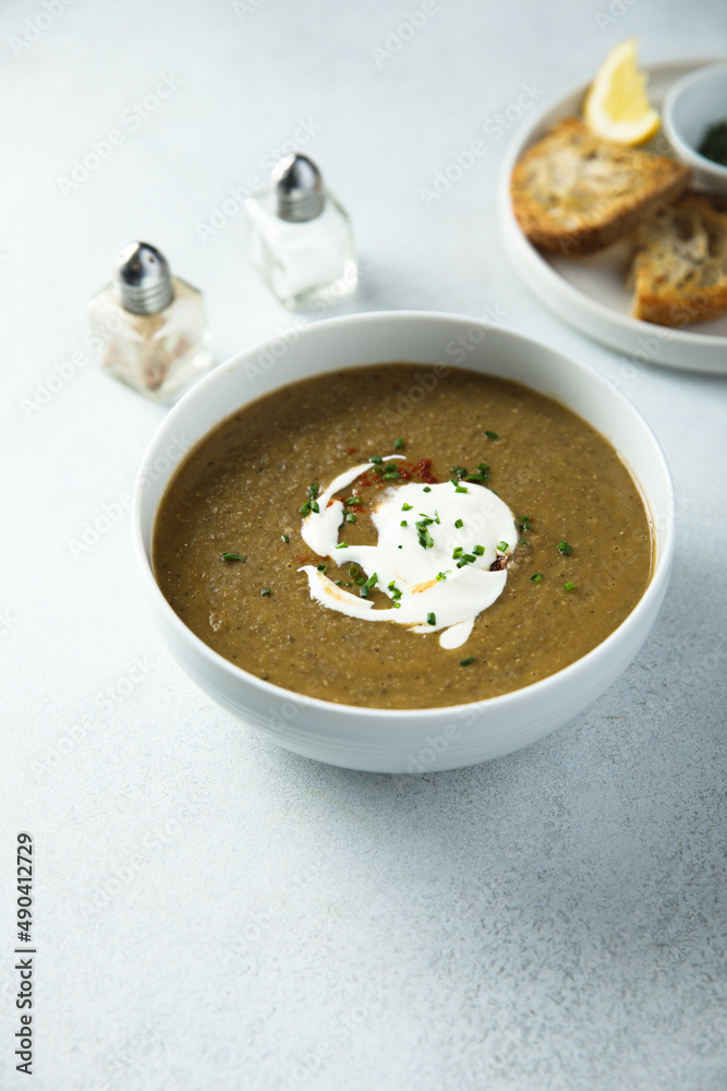 Homemade creamy lentil soup with herbs Homemade creamy lentil soup with herbs