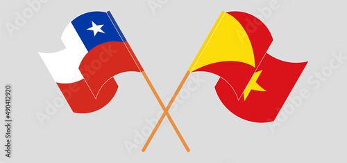 Crossed and waving flags of Chile and Tigray