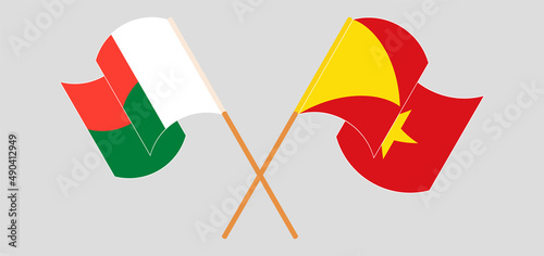 Crossed and waving flags of Madagascar and Tigray