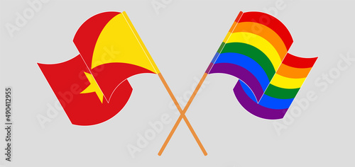 Crossed and waving flags of Tigray and LGBTQ