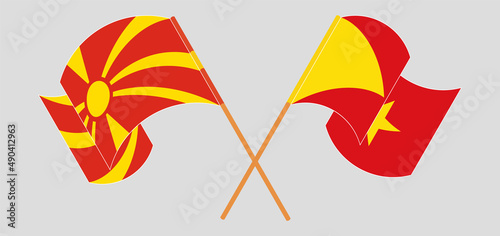Crossed and waving flags of North Macedonia and Tigray