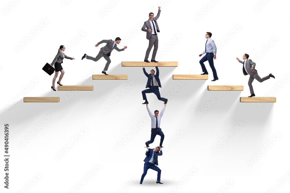 Teamwork concept with businessmen helping each other Teamwork concept with businessmen helping each other