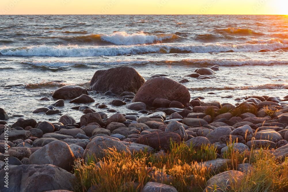 Obraz premium Sunset over the Baltic sea. Rocky shore of Purekkari neem, the Northernmost location of Estonian mainland