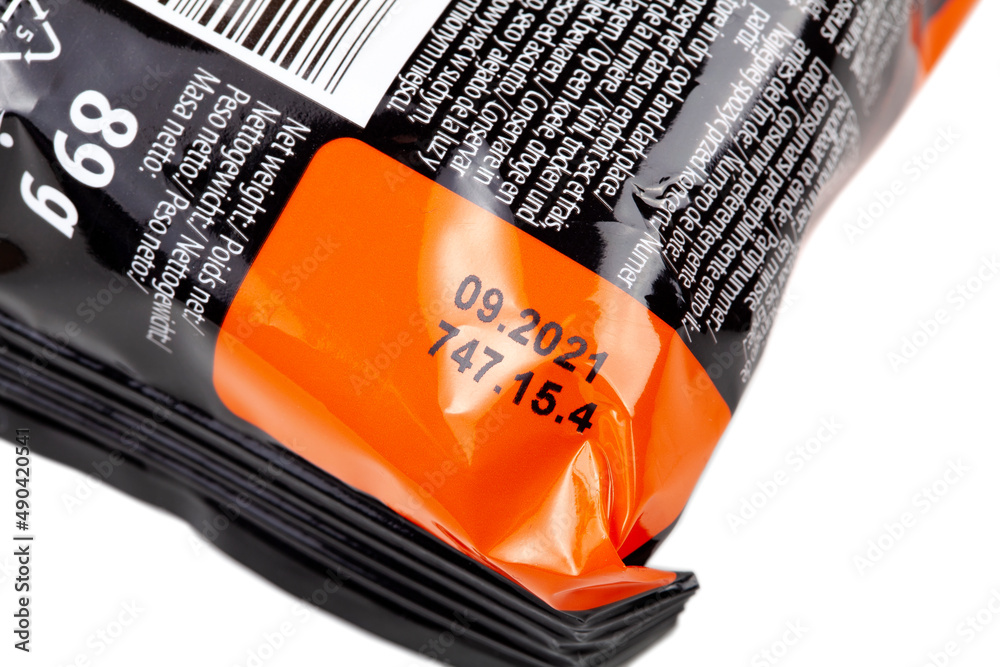 Old packed food past expiration date, date printed on plastic food ...