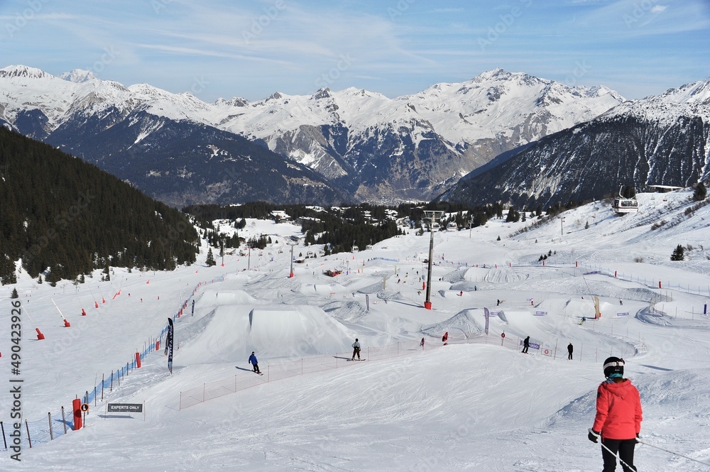 skier in the mountains on a fun park skier in the mountains on a fun park