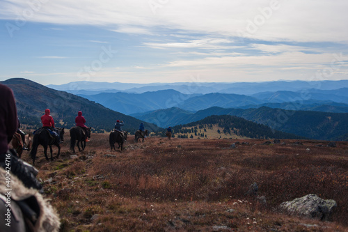 equestrian trip in the Altai mountains, descent from the mountain on horseback
