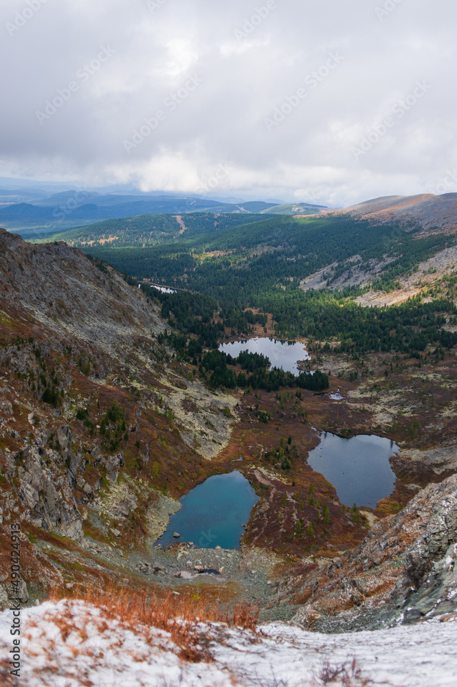 view from the mountain to the chain of blue lakes in the Altai Territory