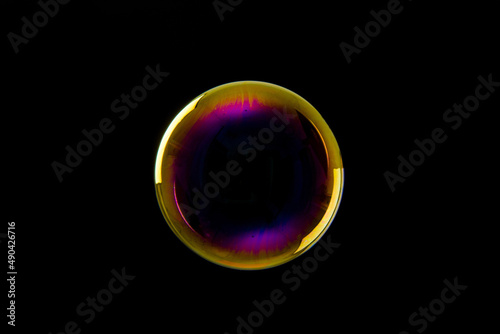Soap bubble isolated on black background. Copy space. © zhikun sun