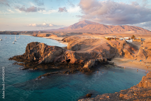 Landscape with turquoise ocean water on Papagayo beach, Lanzarote, Canary Islands, Spain.