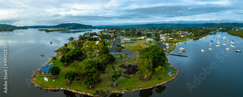 Early morning suburban and bay panorama with trees and playground