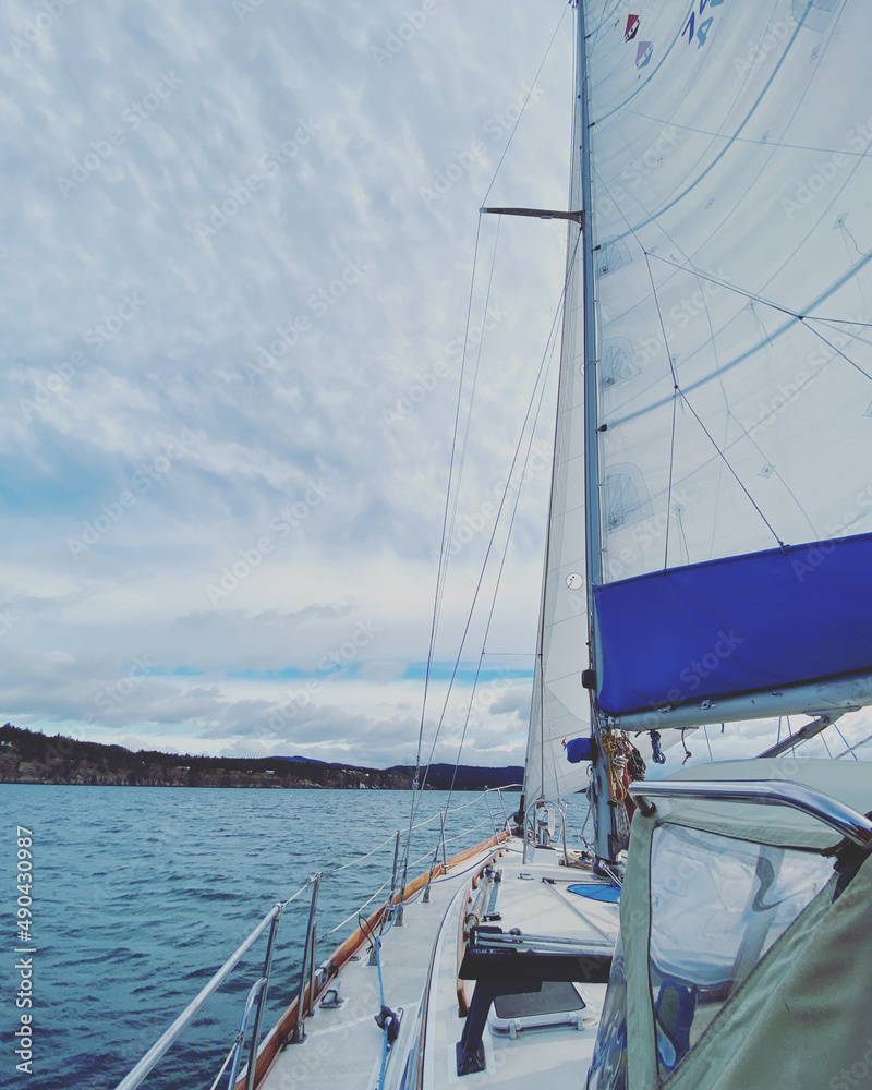Sailing with all sails out with strong winds on the bow Sailing with all sails out with strong winds on the bow