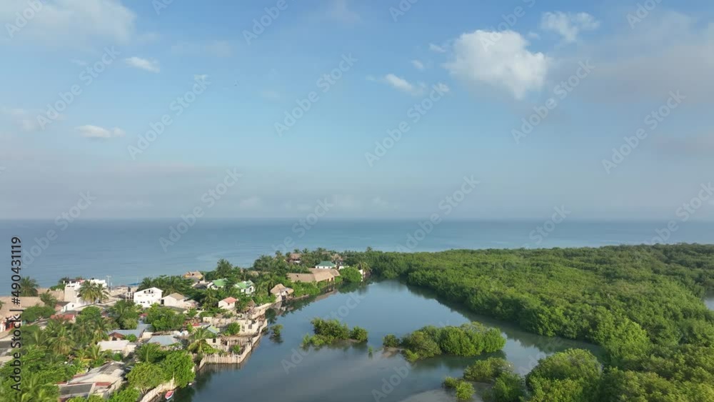 Heavenly Colombian Coastline on Caribbean Sea, Aerial View on Rincon Del Mar Mangroves, Lagoons and Beachfront Buildings on Sunny Day - Drone Shot Heavenly Colombian Coastline on Caribbean Sea, Aerial View on Rincon Del Mar Mangroves, Lagoons and Beachfront Buildings on Sunny Day - Drone Shot