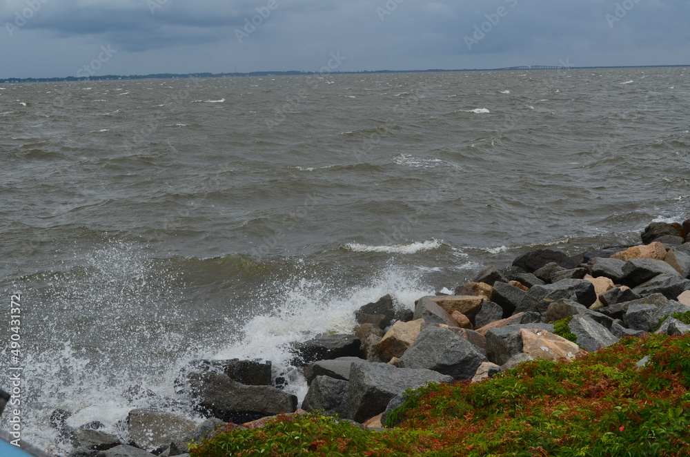 Ocean waves crashing against the rocky shore