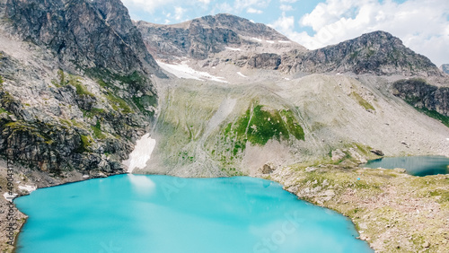 Fototapeta Naklejka Na Ścianę i Meble -  Landscape with a large blue mountain lake in the Caucasus Mountains. lake top view. drone aerial