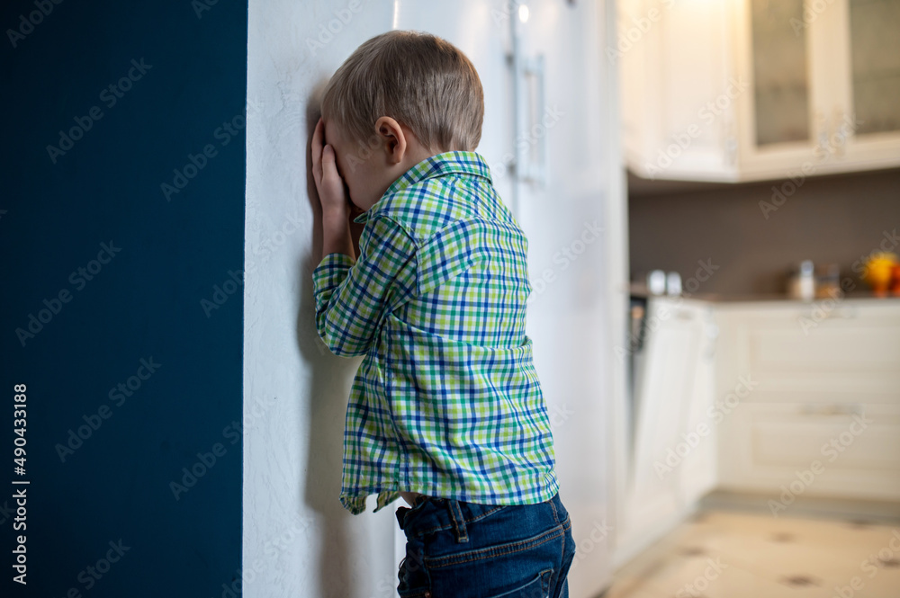 Kid playing hide and sick at home Kid playing hide and sick at home