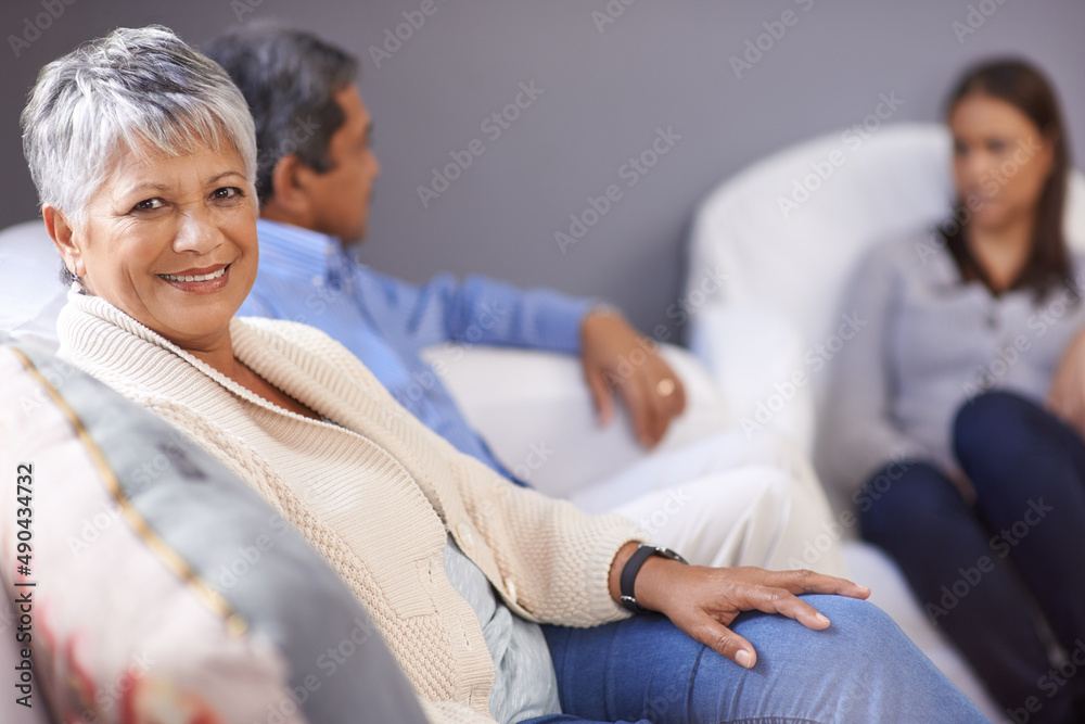 Obraz premium I have the perfect family. Portrait of a senior woman sitting with her husband and adult daughter at home.