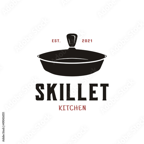 Vintage logo design skillet cast iron for classic restaurant
