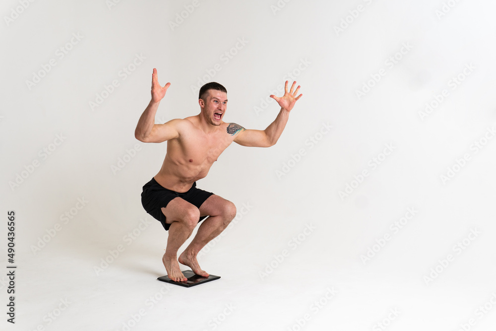 Fototapeta premium Man with weights health pondered, health and sports on a white background muscle, man medicine, human chronic. lumbar sickness, problem suffer attractive