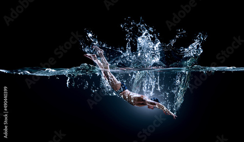 Professional man swimmer on a wave © Sergey Nivens