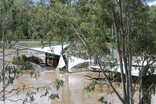Partially submerged Buildingins in Receding Flooded Brisbane River at Colleges Crossing Recreation Park near Ipswich, Queensland Australia 1st March 2022. Worst Flooding in Decades, State of Emergency