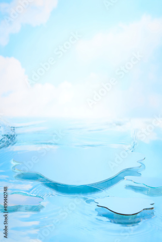 Front view of water sphere with a cloudy background for water advertising 
