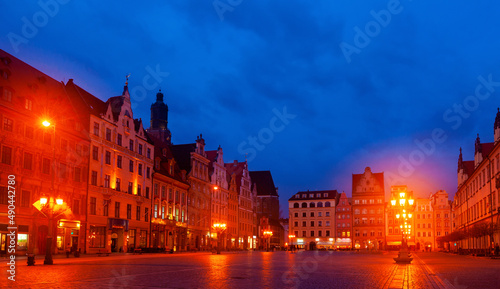 Scenic view of central Market Square of Wroclaw with traditional tenements at dusk