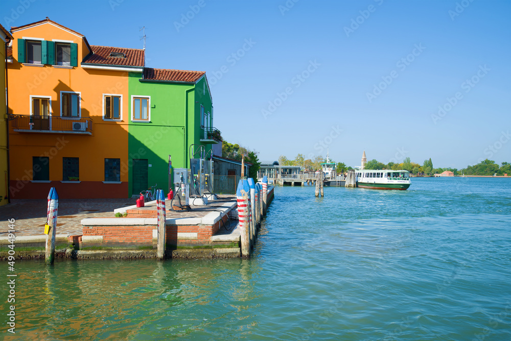 Petrol station for small-sized vessels and boats on the city embankment. Burano Island, Venice
