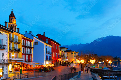Illuminated historical center of Swiss town of Ascona in canton of Ticino at night photo