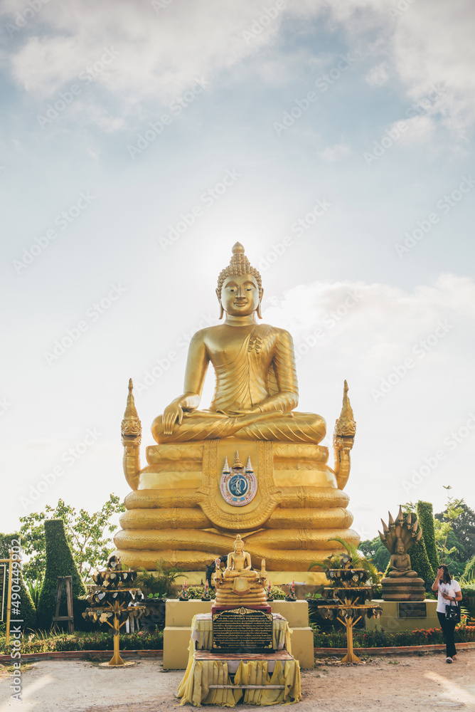 Gold statue of Buddha in Phuket, Thailand