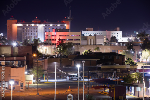 Nighttime view of the downtown cityscape of Mexicali, Baja California, Mexico.