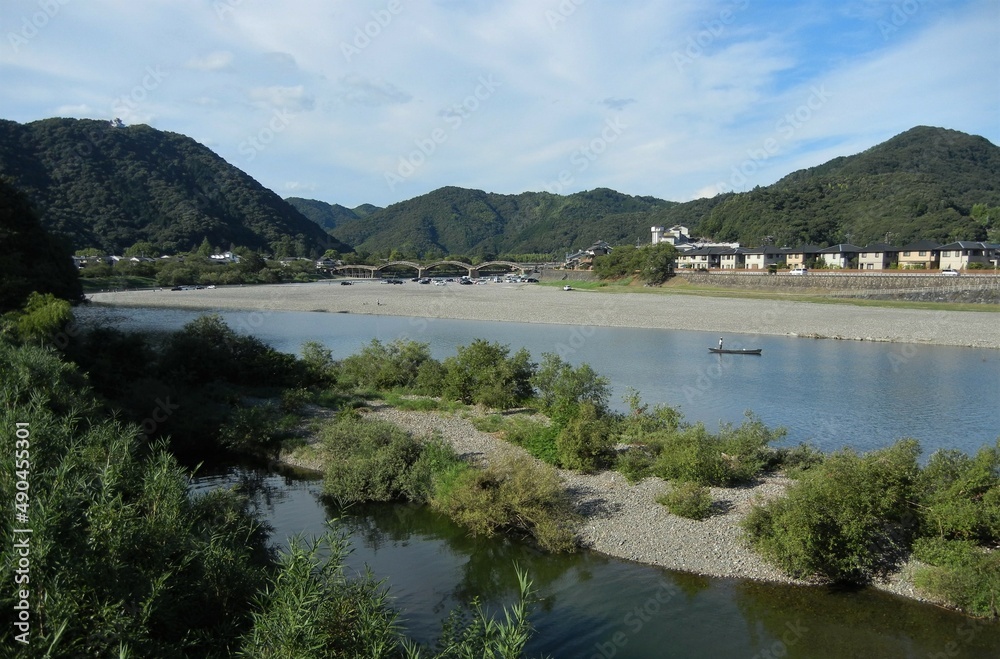A view of Kintai-kyou Bridge anf Nishiki-gawa River in Iwakuni City in Yamaguchi Pref. in Japan 日本の山口県岩国市にある錦帯橋と錦川の一風景