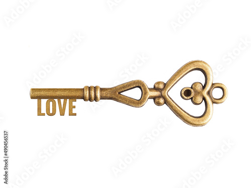 Bronze vintage antique keys with word Love and heart shape isolated on white background