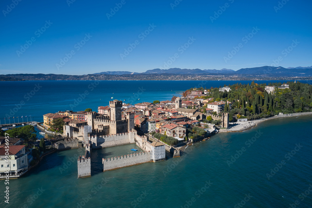 Aerial panorama of Sirmione. Autumn in Sirmione. Sirmione aerial view. Top view, historic center of the Sirmione peninsula, lake garda. Lake Garda, Sirmione, Italy. Italian castle on Lake Garda.