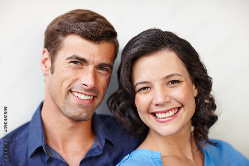 Live. Laugh. Love.. Portrait of a beautiful couple smiling happily while spending time together. Live. Laugh. Love.. Portrait of a beautiful couple smiling happily while spending time together.