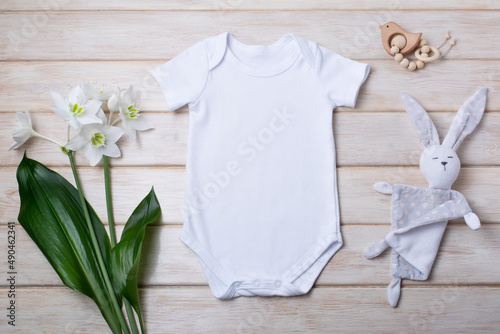 White baby short sleeve bodysuit mockup with lily and bunny rabbit