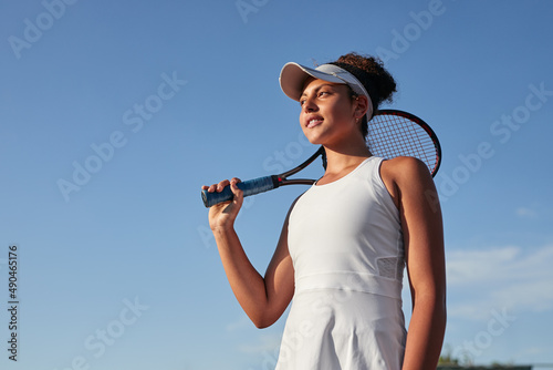 Black sportswoman with tennis racket