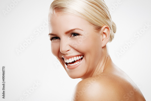 Laughter is the best beauty treatment. Studio shot of a laughing blonde woman with copyspace.