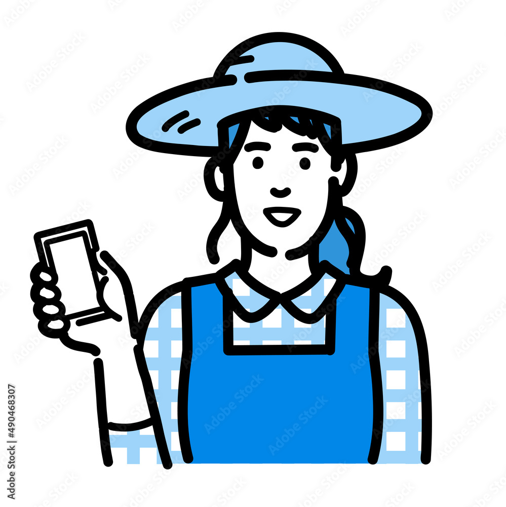 スマートフォンを持っている麦わら帽をかぶった農家の女性
