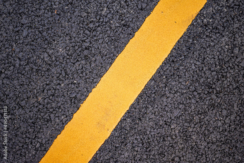 Fototapeta premium New asphalt road surface with yellow line background