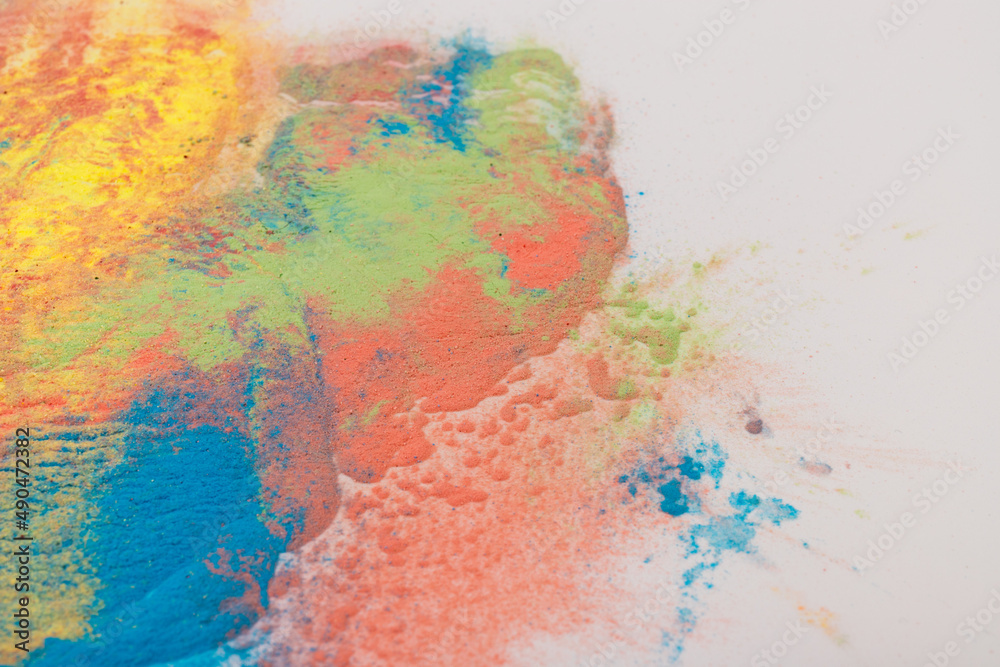 Abstract colorful Happy Holi background. Indian Holi festival of colours. Colorful powder explosion.