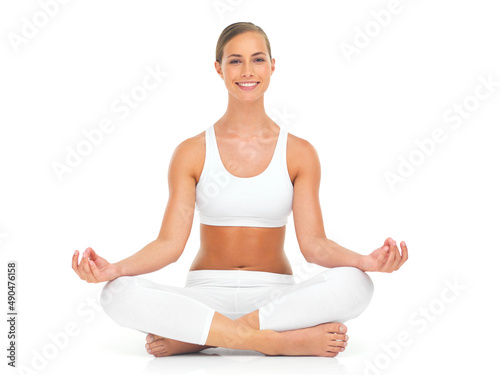Meditating can change your mood completely. Portrait of an attractive young woman practicing the art of meditation.