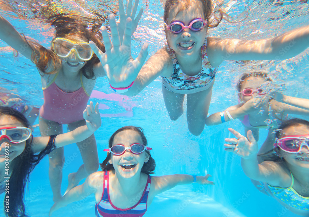 kids swimming in pool