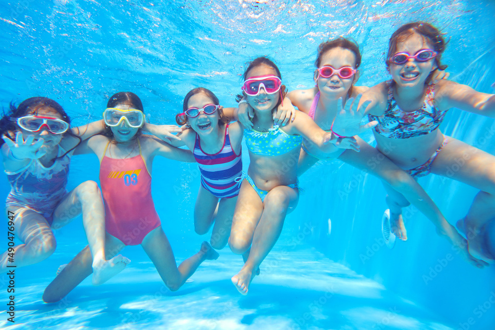 kids swimming in pool