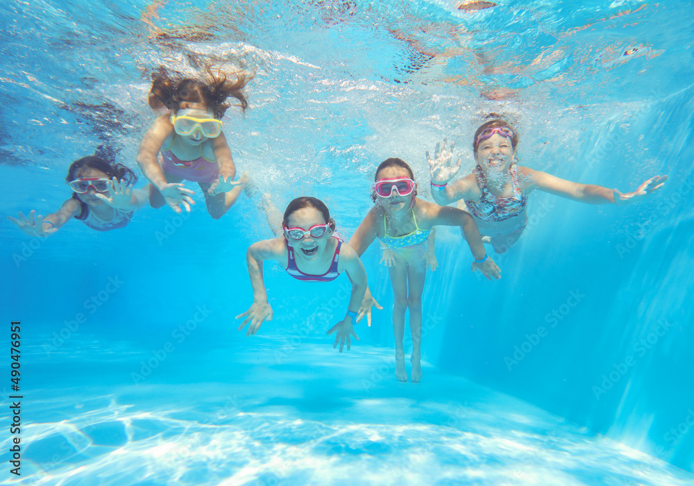 kids swimming in pool