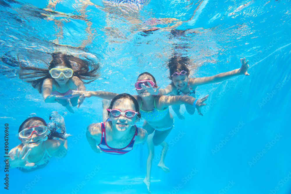 kids swimming  in pool