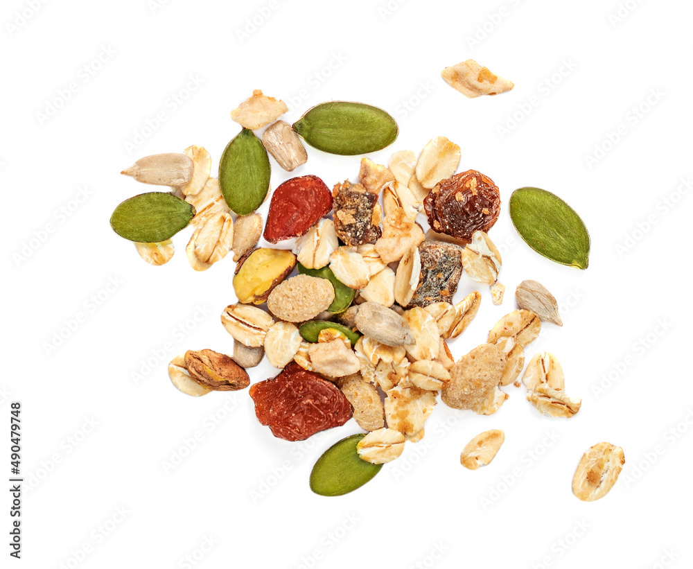 Muesli with Nuts, seeds and dried fruits isolated on white background. Flat lay. Top view. Muesli with Nuts, seeds and dried fruits isolated on white background. Flat lay. Top view.